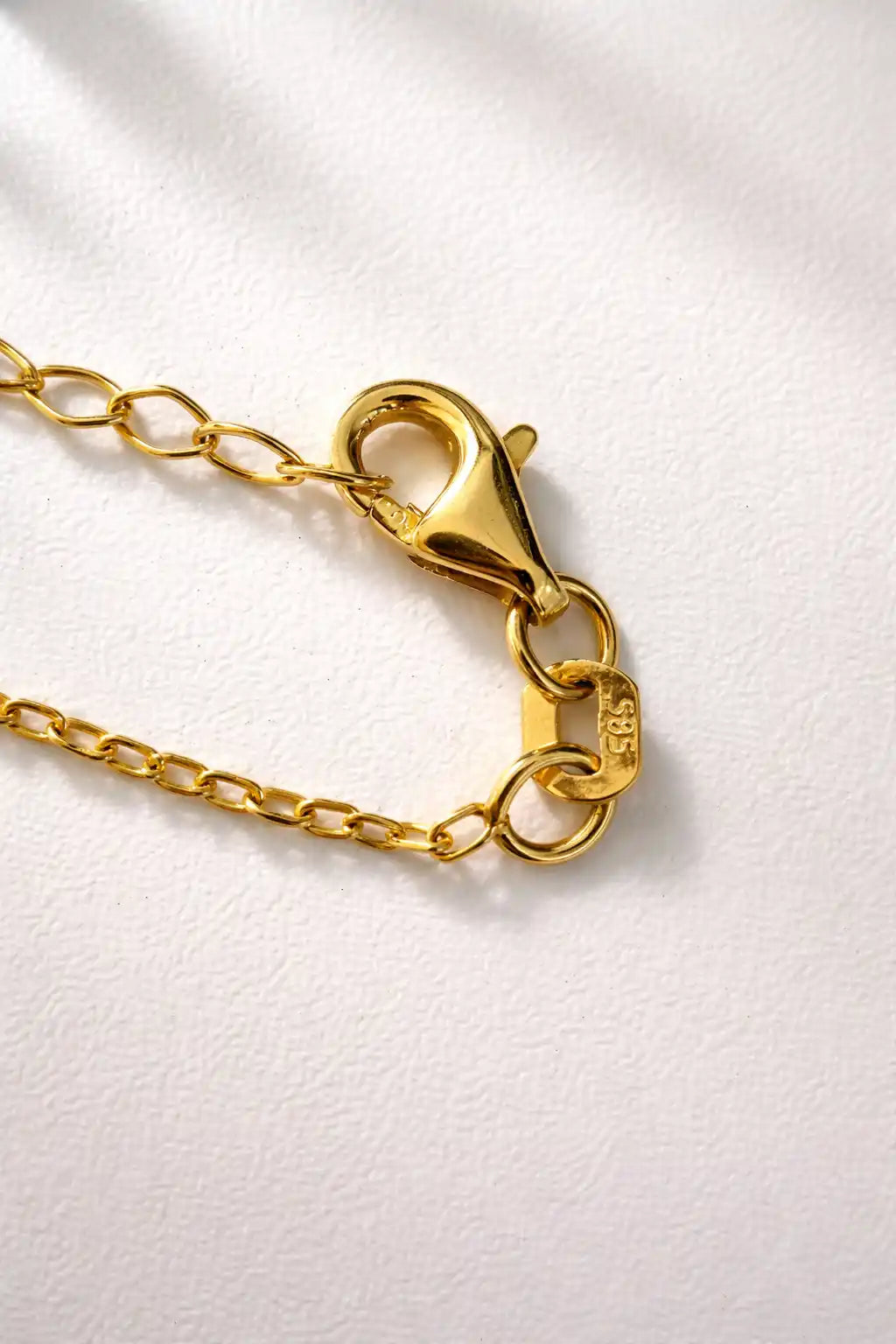 Cadena con colgante de mariquita